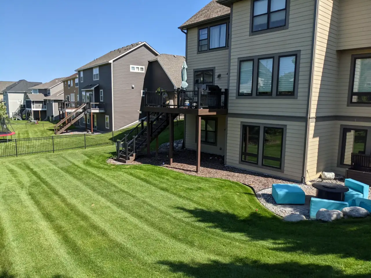 Backyard lawn maintenance in Plymouth