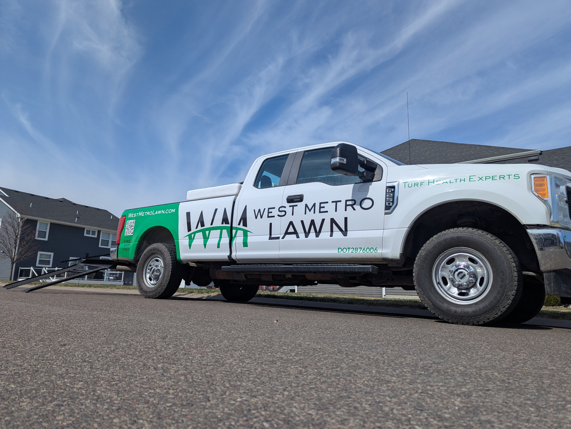 West Metro Lawn & Snow branded truck on the job